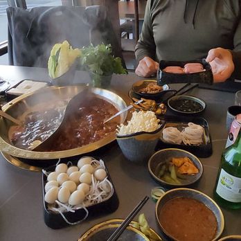 Xi Hotpot - BYOB drinks, double soup base(spicy beef tallow, mushroom) quail eggs, noodles, enoki mushrooms, sausage, cabbage - Hot Pot Near Me - Duluth, Georgia