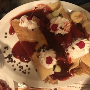Chez Mo-Nik - Pancakes, ice cream, fruit salad, chocolate chips, whipped cream, cherry, strawberry syrup on top - Breakfast & Brunch Near Me - Gatineau, Quebec