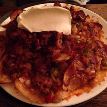 Stuff Yer Face - Pulled Pork Potachos - Pubs Near Me - New Brunswick, New Jersey Stuff Yer Face - Pulled Pork Potachos - Pubs Near Me - New Brunswick, New Jersey