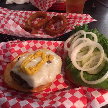 Basement Burger Bar - My ground beef with Swiss cheese with side of onion rings. - American Near Me - Detroit, Michigan