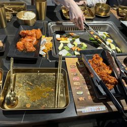 Eat Korean BBQ & Shabu Shabu - Vegetables, spicy pork, and spicy chicken.
