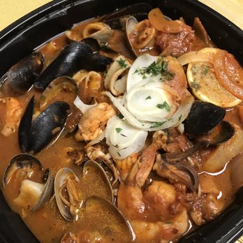 The Hideout Kitchen - Hubby's Seafood Stew with mussels, clams, shrimp and calamari in a rich tomato broth. Wish it came with some good bread! - New American Near Me - Lafayette, California