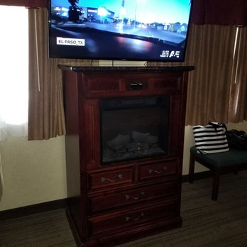 Dynasty Suites Redlands Hotel - TV stand and fireplace - Hotels Near Me - Redlands, California Dynasty Suites Redlands Hotel - TV stand and fireplace - Hotels Near Me - Redlands, California