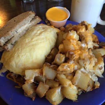 Squeeze In - The Hangover Omelet (see the cheese sauce). - Breakfast & Brunch Near Me - Sparks, Nevada Squeeze In - The Hangover Omelet (see the cheese sauce). - Breakfast & Brunch Near Me - Sparks, Nevada