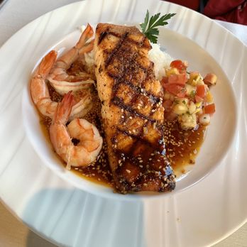 Rusty Pelican - Salmon firepot - Seafood Near Me - Newport Beach, California Rusty Pelican - Salmon firepot - Seafood Near Me - Newport Beach, California