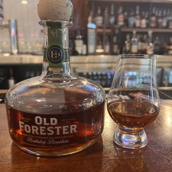 OAK at The Glen - a bottle of old forester and a glass of brandy - Bars Near Me - Glenview, Illinois OAK at The Glen - a bottle of old forester and a glass of brandy - Bars Near Me - Glenview, Illinois