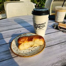 Sausage and cheese kolache with 1/4 summer moon latte Sausage and cheese kolache with 1/4 summer moon latte