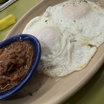Snooze, an A.M. Eatery - Braised beef with sunny side eggs - Breakfast & Brunch Near Me - Dallas, Texas