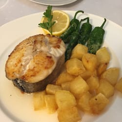 Meson Arropain - Grilled Hake with roasted peppers and fried potatoes in a lemon sauce