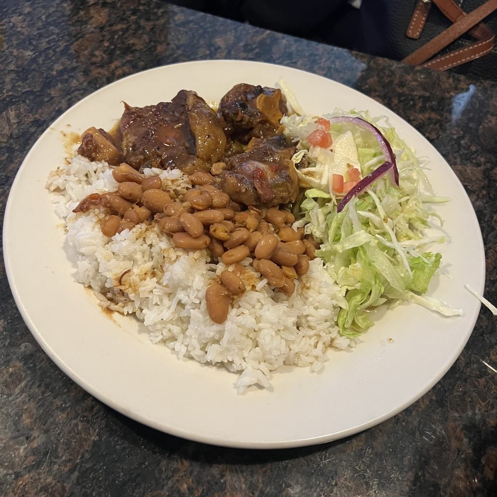 Elizabeth's - a plate of rice, beans, lettuce, and meat - Seafood Near Me - New Bedford, Massachusetts Elizabeth's - a plate of rice, beans, lettuce, and meat - Seafood Near Me - New Bedford, Massachusetts