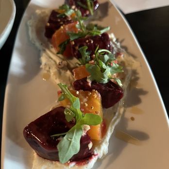 Ocotillo - Smoked beets with herb, ricotta, baby arugula, local pecans, Arizona, honey and bee pollen - New American Near Me - Phoenix, Arizona