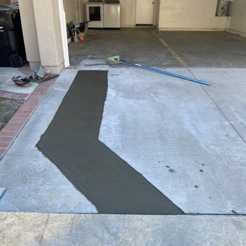 Roman Concrete - He replaced a section of concrete where a sewer line had had to be dug up. Image is before the concrete dried. - Masonry/Concrete Near Me - Anaheim, California Roman Concrete - He replaced a section of concrete where a sewer line had had to be dug up. Image is before the concrete dried. - Masonry/Concrete Near Me - Anaheim, California