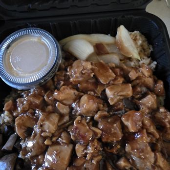 Bartell's Take - Hibachi Chicken. Nice container of yum yum sauce, cooked onions on top of container. Rice under chicken. Note this was a double order. - Food Trucks Near Me Bartell's Take - Hibachi Chicken. Nice container of yum yum sauce, cooked onions on top of container. Rice under chicken. Note this was a double order. - Food Trucks Near Me