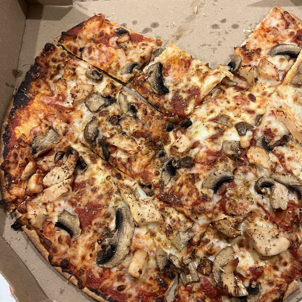 Chicken and mushroom thin crust pizza Chicken and mushroom thin crust pizza