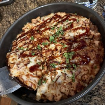 BJ's Restaurant & Brewhouse - BBQ Barbeque Chicken Pizza - Shareable. Don't let the photo fool you, the toppings were skimpy when you pulled out the pieces. - New American Near Me - Waco, Texas