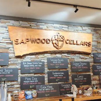 Sapwood Cellars Brewery - a woman sitting at a bar - Breweries Near Me - Columbia, Maryland Sapwood Cellars Brewery - a woman sitting at a bar - Breweries Near Me - Columbia, Maryland