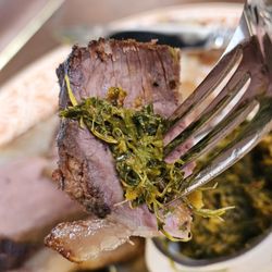 The Vault At Liberty Trust - Close-up of a fork holding a piece of the C.A.B. Picahna Steak main course.