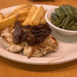 Chicken with mushrooms and onions, green beans and steak fries. Chicken with mushrooms and onions, green beans and steak fries.