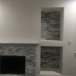 Look at my beautiful tiled fireplace that Josh "rejuvenated" from an old red brick fireplace. Look at my beautiful tiled fireplace that Josh "rejuvenated" from an old red brick fireplace.