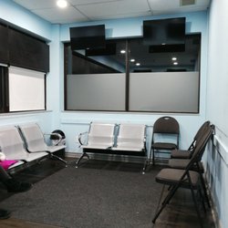 Energy Martial Arts Academy - Waiting room equipped with tvs to monitor the classes in progress.
