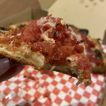 Union Pizza Company - a hand holding a slice of pizza - Pizza Near Me - Manhattan Beach, California Union Pizza Company - a hand holding a slice of pizza - Pizza Near Me - Manhattan Beach, California
