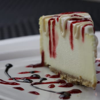 Solea Mexican Grill - a slice of cheesecake on a plate - Mexican Near Me - Menasha, Wisconsin Solea Mexican Grill - a slice of cheesecake on a plate - Mexican Near Me - Menasha, Wisconsin