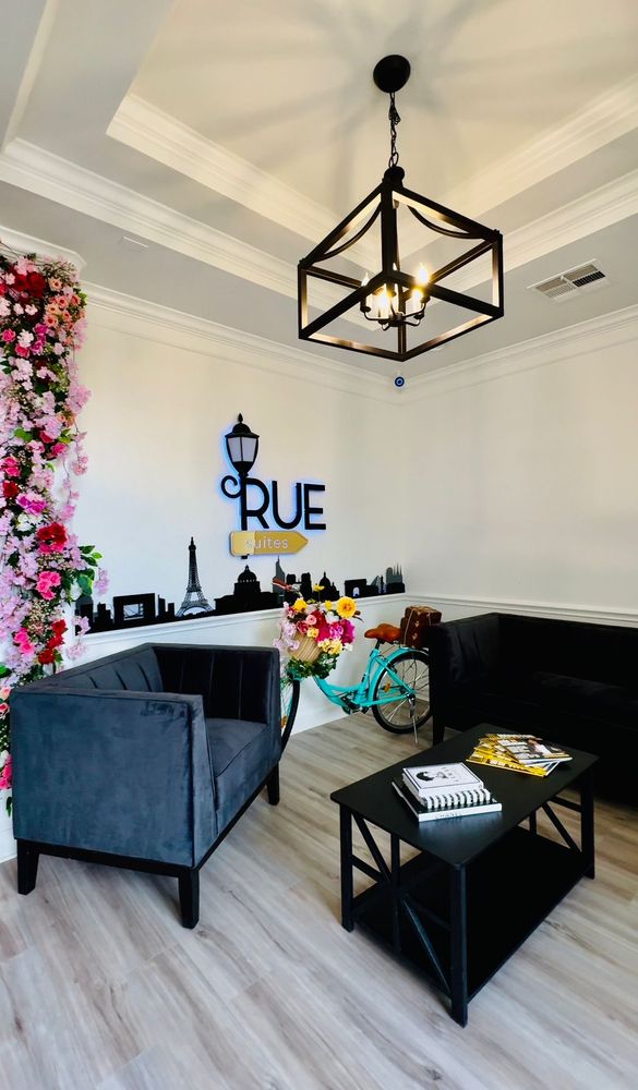 Rue Suites Logo