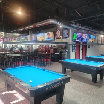 Bearded Monkey Sports Bar & Grill - Four pool tables with comfy gallery seating along the wall. Very nice floorplan in this brand new sports bar. - Sports Bars Near Me - Rockwall, Texas Bearded Monkey Sports Bar & Grill - Four pool tables with comfy gallery seating along the wall. Very nice floorplan in this brand new sports bar. - Sports Bars Near Me - Rockwall, Texas