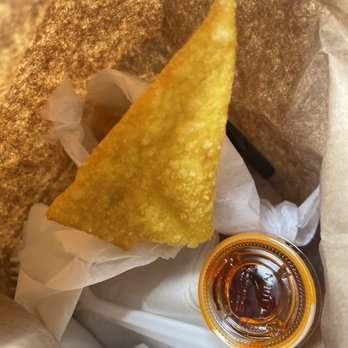 Kim Wong Chinese Kitchen - a piece of food in a wrapper - Chinese Near Me - Valley Stream, New York Kim Wong Chinese Kitchen - a piece of food in a wrapper - Chinese Near Me - Valley Stream, New York