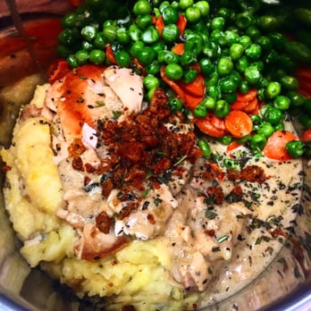 Monica's Restaurant - a bowl of mashed potatoes and peas - New American Near Me - Beaumont, Texas