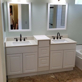 JLE Home Improvement - bathroom with two sinks and a tub - General Contractors Near Me JLE Home Improvement - bathroom with two sinks and a tub - General Contractors Near Me