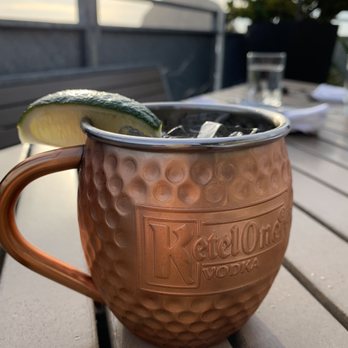 Dorn's Original Breakers Cafe - Moscow mule with a view of Morro Rock. - Seafood Near Me - Morro Bay, California