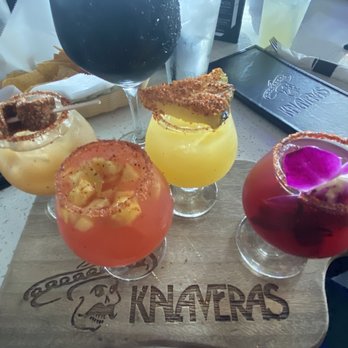 Kalaveras - Mimosa Flight. They choose the mimosas for you, you can't pick the ones you want to try. - Bars Near Me - Riverside, California