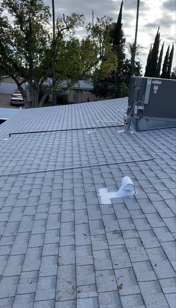 Slide of USA Roofing Maintenance