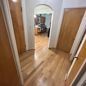 Perfect Hardwood Flooring - a view of the kitchen from the hallway - Flooring Near Me - Chicago, Illinois Perfect Hardwood Flooring - a view of the kitchen from the hallway - Flooring Near Me - Chicago, Illinois