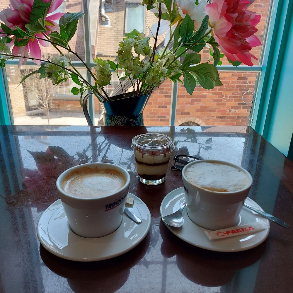 Lola's Choco Bar and Sweet House - two cups of coffee on a table - Desserts Near Me - Burlington, Ontario Lola's Choco Bar and Sweet House - two cups of coffee on a table - Desserts Near Me - Burlington, Ontario