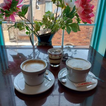 Lola's Choco Bar and Sweet House - two cups of coffee on a table - Desserts Near Me - Burlington, Ontario Lola's Choco Bar and Sweet House - two cups of coffee on a table - Desserts Near Me - Burlington, Ontario