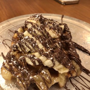 Zinneken's - Harvard Square - Waffle with Nutella and banana - Belgian Near Me - Cambridge, Massachusetts Zinneken's - Harvard Square - Waffle with Nutella and banana - Belgian Near Me - Cambridge, Massachusetts