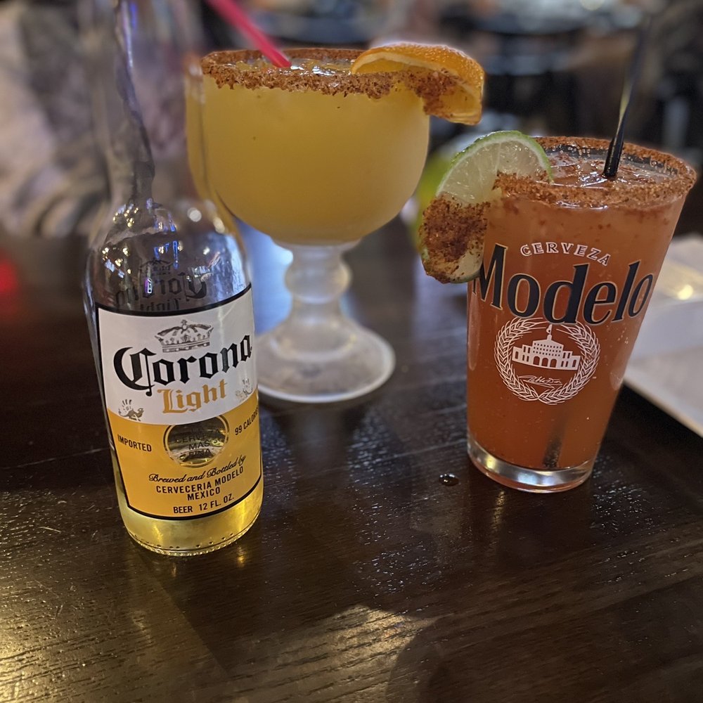 One Taco Dos Tequilas - a bottle of coronano and a margarita - Mexican Near Me - Bartlett, Illinois One Taco Dos Tequilas - a bottle of coronano and a margarita - Mexican Near Me - Bartlett, Illinois