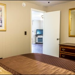 Marina Inn and Event Center - master bdrm of poolside unit
