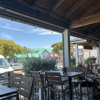 My Village Pub - Cool porch overlooking downtown - New American Near Me - Siesta Key, Florida My Village Pub - Cool porch overlooking downtown - New American Near Me - Siesta Key, Florida