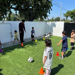 Tiny Thinkers Preschool - Canoga Park - Game on! Our soccer coach with our little stars in action!!