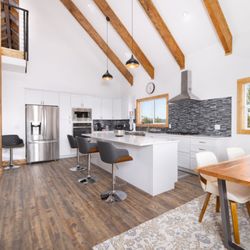 Built Right in Montana - One open room can still feel warm and cozy depending on the materials.