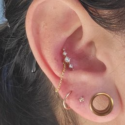 New conch with chain, new jewelry for 2nd and 3rd piercings on lobe.