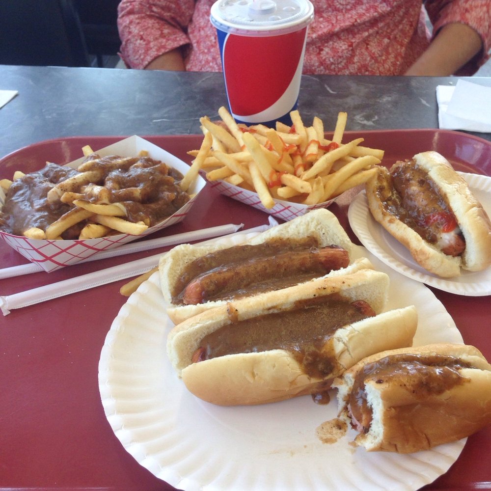 Dogs with just sauce. Fries with sauce and cheese.