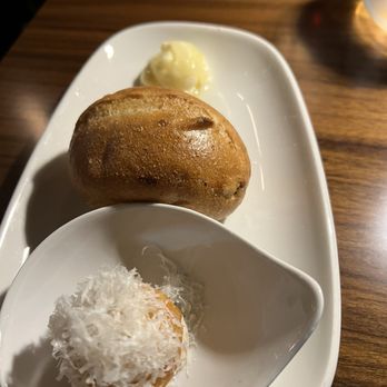 Il Girasole - Amuse bouche. Some little potato thingie. And good bread with ricotta butter. - Italian Near Me - Costa Mesa, California Il Girasole - Amuse bouche. Some little potato thingie. And good bread with ricotta butter. - Italian Near Me - Costa Mesa, California