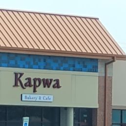Exterior outside entrance of Kapwa Bakery & Cafe - Kapwa Bakery and Cafe facade - Niles, Illinois Exterior outside entrance of Kapwa Bakery & Cafe - Kapwa Bakery and Cafe facade - Niles, Illinois