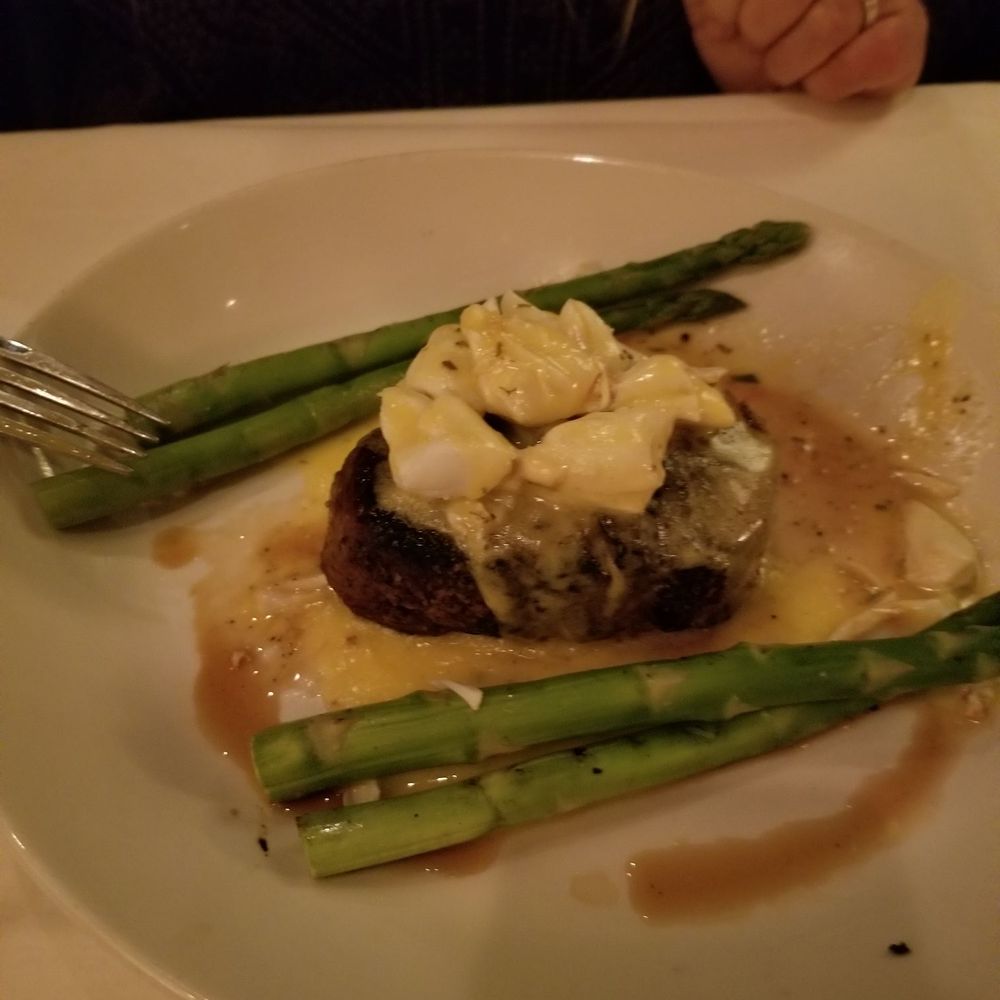 Sullivan's Steakhouse - Filet mignon topped with crab and bearnaise sauce. Asparagus on the side - Steakhouses Near Me - Tucson, Arizona Sullivan's Steakhouse - Filet mignon topped with crab and bearnaise sauce. Asparagus on the side - Steakhouses Near Me - Tucson, Arizona