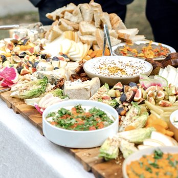 Lighthouse - a table full of food and snacks - Wine Bars Near Me - Brooklyn, New York