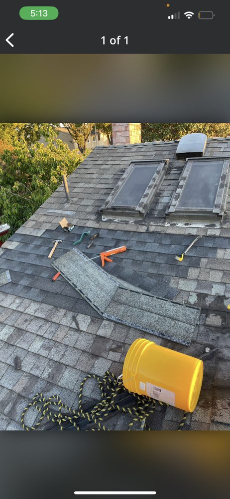 Slide of Michael Roofing and Tree Trimming